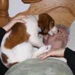 Puppy Leo giving Grandpa Kisses